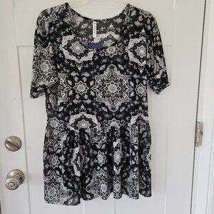 Ladies Piphany Short sleeve Peplum top. sheer Stretchy size Sm. NWT